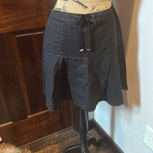 WHBM  black 16 “ skirt size 2 new with out tag. Waist detail tie.